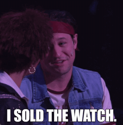 A Man And A Woman Are Looking At Each Other And The Man Is Saying I Sold The Watch GIF