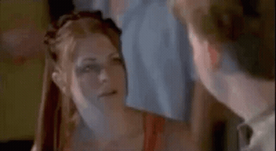 A Man And A Woman Are Looking At Each Other And The Woman Is Saying You Can 'T Just . GIF