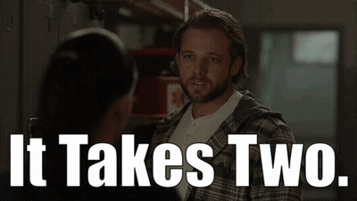 A Man And A Woman Are Looking At Each Other And The Words It Takes Two Are Above Them GIF