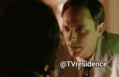 A Man And A Woman Are Looking At Each Other And The Words @Tvresidence Are Above Them GIF