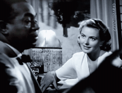 A Man And A Woman Are Looking At Each Other In A Black And White Photo Taken By Craveno2022 GIF