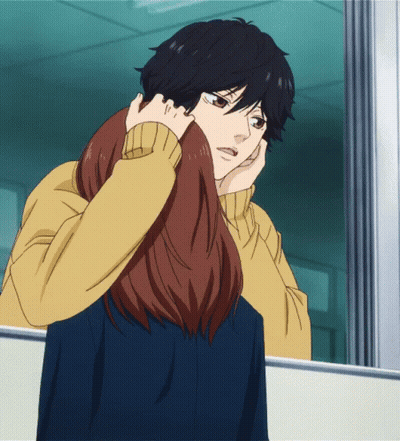 A Man And A Woman Are Looking At Each Other In A Mirror GIF