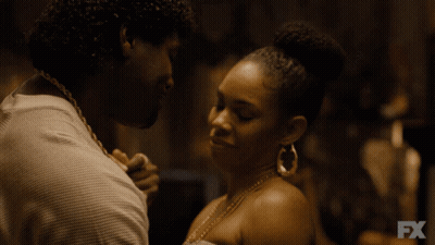 A Man And A Woman Are Looking At Each Other With Fx Written On The Bottom GIF
