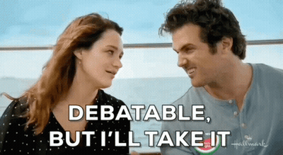 A Man And A Woman Are Looking At Each Other With The Words Debatable But I 'Ll Take It GIF