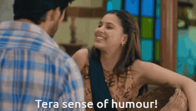 A Man And A Woman Are Looking At Each Other With The Words Tera Sense Of Humour Below Them GIF