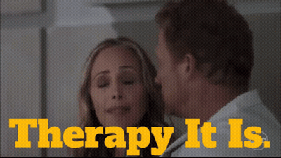 A Man And A Woman Are Looking At Each Other With The Words Therapy It Is Written Above Them GIF