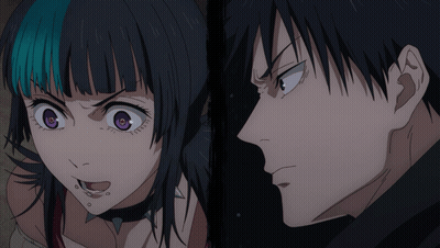 A Man And A Woman Are Looking At Each Other With Their Eyes Closed GIF