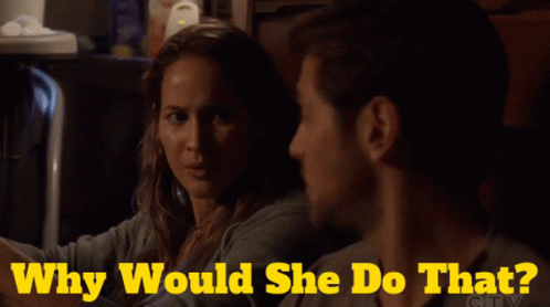 A Man And A Woman Are Looking At Each Other With Why Would She Do That Written Above Them GIF