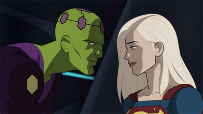 A Man And A Woman Are Looking At Each Other GIF