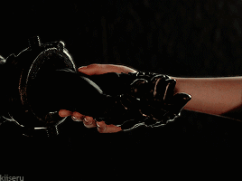 A Man And A Woman Are Looking Into Each Other 'S Eyes And The Words Kitseru Are On The Bottom Right GIF