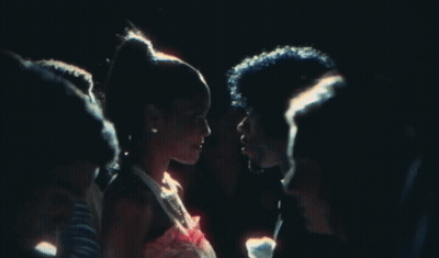 A Man And A Woman Are Looking Into Each Other 'S Eyes GIF
