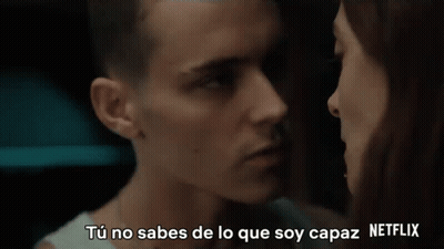 A Man And A Woman Are Looking Into Each Other 'S Eyes With Netflix Written In The Upper Right Corner GIF