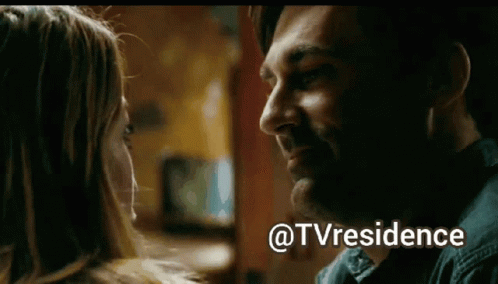 A Man And A Woman Are Looking Into Each Other 'S Eyes With The Words @Tvresidence Written Below Them GIF
