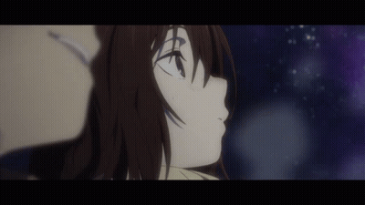 A Man And A Woman Are Looking Up At The Stars In The Night Sky . GIF
