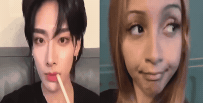 A Man And A Woman Are Making Funny Faces . GIF
