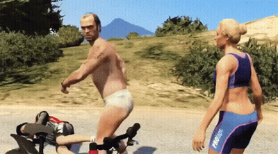 A Man And A Woman Are Playing A Video Game And The Man Is Wearing A Diaper And The Woman Is Wearing A Bikini GIF