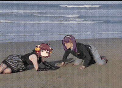 A Man And A Woman Are Playing In The Sand On The Beach GIF
