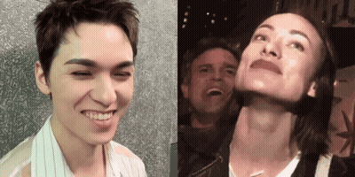 A Man And A Woman Are Posing For A Picture And The Man Is Smiling GIF