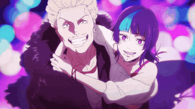 A Man And A Woman Are Posing For A Picture And The Woman Has Purple Hair . GIF