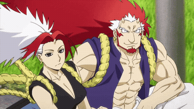 A Man And A Woman Are Posing For A Picture Together GIF