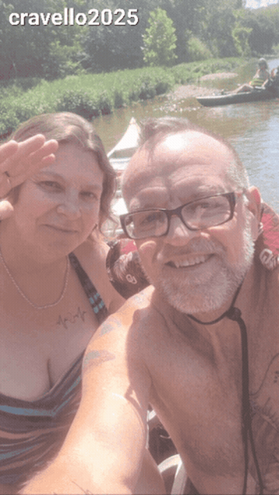 A Man And A Woman Are Posing For A Picture With The Year 2025 On The Bottom Right GIF
