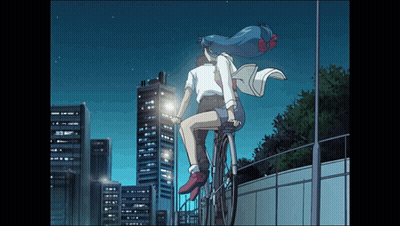 A Man And A Woman Are Riding A Bike In Front Of A City Skyline GIF
