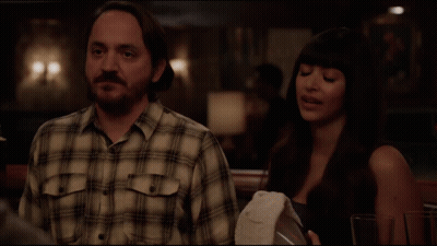 A Man And A Woman Are Sitting At A Table And The Man Says That 'S Right GIF