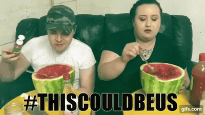 A Man And A Woman Are Sitting At A Table Eating Watermelon With #Thiscouldbeus Written On The Bottom GIF