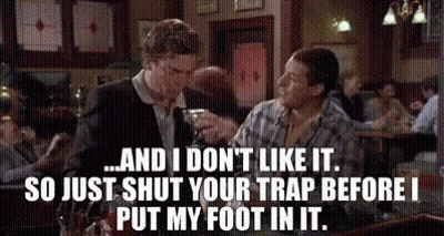 A Man And A Woman Are Sitting At A Table In A Restaurant With A Caption That Says And I Don T Like It GIF
