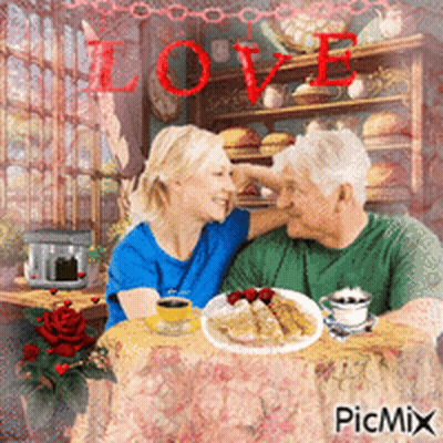 A Man And A Woman Are Sitting At A Table With A Plate Of Food And A Cup Of Coffee With The Word Love In Red GIF