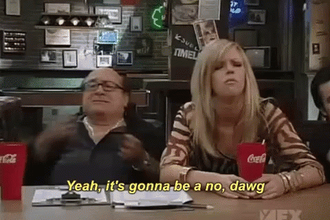 A Man And A Woman Are Sitting At A Table With Coca Cola Cups .. GIF