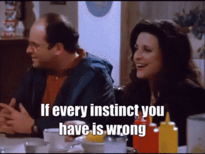 A Man And A Woman Are Sitting At A Table With The Words If Every Instinct You Have Is Wrong On The Screen GIF