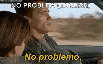 A Man And A Woman Are Sitting In A Car And The Man Is Saying `` No Problem ( English ) No Problema . '' GIF