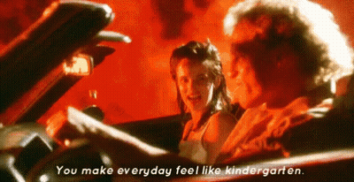 A Man And A Woman Are Sitting In A Car With The Words " You Make Everyday Feel Like Kindergarten " GIF