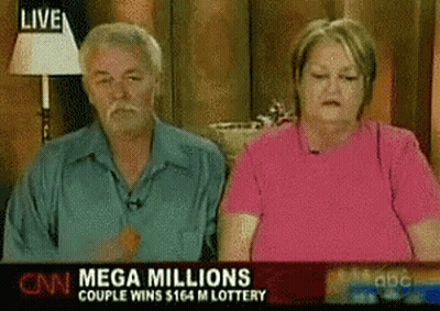 A Man And A Woman Are Sitting In Front Of A Cnn Mega Millions Couple Wins $ 164 M Lottery Banner GIF
