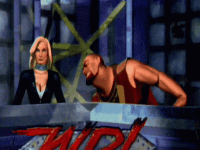 A Man And A Woman Are Sitting In Front Of A Sign That Says ' Twist ' GIF