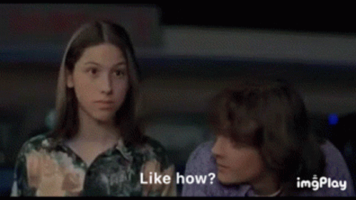 A Man And A Woman Are Sitting Next To Each Other And One Of Them Is Asking The Other How They Like It . GIF