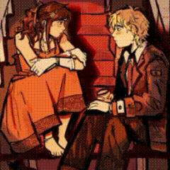 A Man And A Woman Are Sitting Next To Each Other And Talking GIF