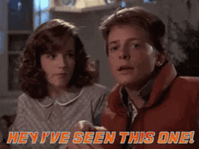 A Man And A Woman Are Sitting Next To Each Other And The Man Says Hey I 'Ve Seen This One ! GIF