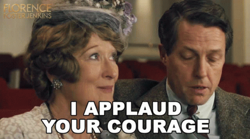 Man And Woman Sitting, Man Says I Applaud Your Courage GIF