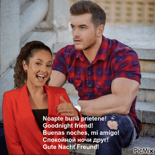 A Man And A Woman Are Sitting Next To Each Other And The Woman Is Laughing GIF