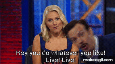 A Man And A Woman Are Sitting Next To Each Other And The Woman Is Saying Hey You Do Whatever You Like GIF