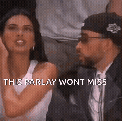 A Man And A Woman Are Sitting Next To Each Other And The Woman Is Saying This Parlay Won 'T Miss . GIF