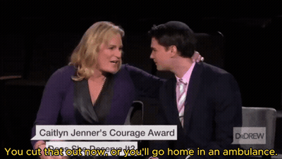 A Man And A Woman Are Sitting Next To Each Other And The Woman Is Talking About Caitlyn Jenner 'S Courage Award GIF