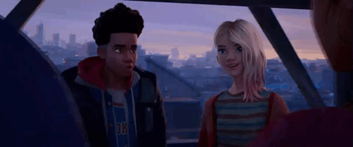 A Man And A Woman Are Sitting Next To Each Other On A Balcony . GIF