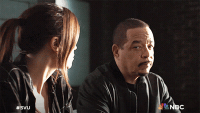 A Man And A Woman Are Sitting Next To Each Other With A Nbc Logo On The Bottom GIF