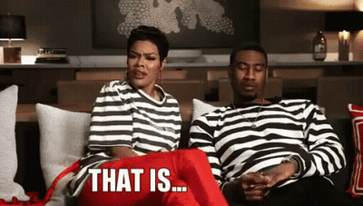 A Man And A Woman Are Sitting On A Couch And The Man Is Saying That Is ... GIF