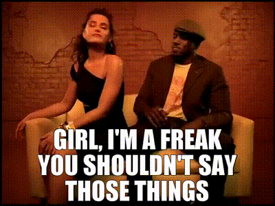 A Man And A Woman Are Sitting On A Couch And The Woman Says Girl I 'M A Freak GIF