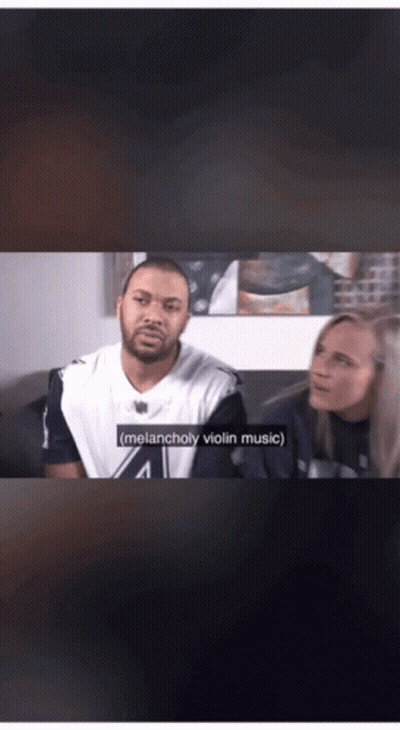 A Man And A Woman Are Sitting On A Couch With The Man Saying Melancholy Violin Music GIF
