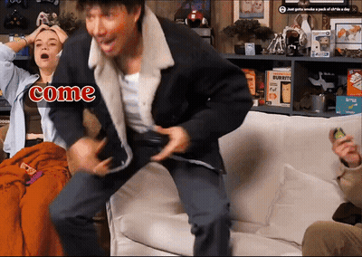 A Man And A Woman Are Sitting On A Couch With The Word Come On The Bottom GIF